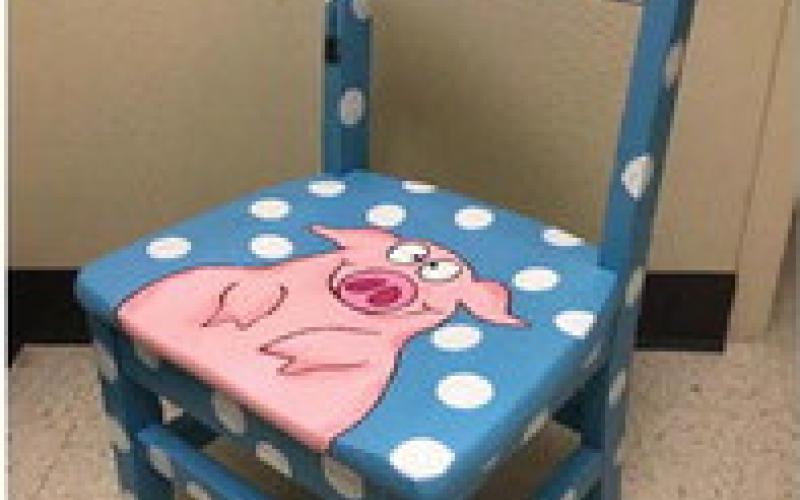 A chair depicting “Charlotte’s Web” was submitted by a local artist for the 2022 Painted Chair Event fundraiser. courtesy photo | Lampasas Public Library