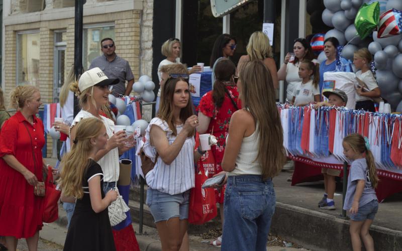 Lampasas Texas Title was one of the many downtown businesses involved in Tuesday’s Sip ’N’ Shop event. From lemonade to milkshakes and all the way to wine offerings, each business featured unique refreshments for visitors. ERICK MITCHELL | DISPATCH RECORD