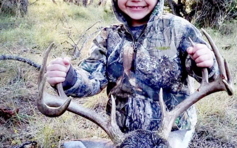 Young hunter shoots first buck