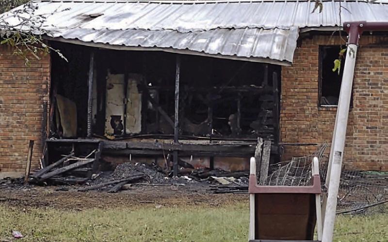 Extensive damage was done to the interior of this home on West First Street after a fire started Sunday on the back porch. DAVID LOWE | DISPATCH RECORD