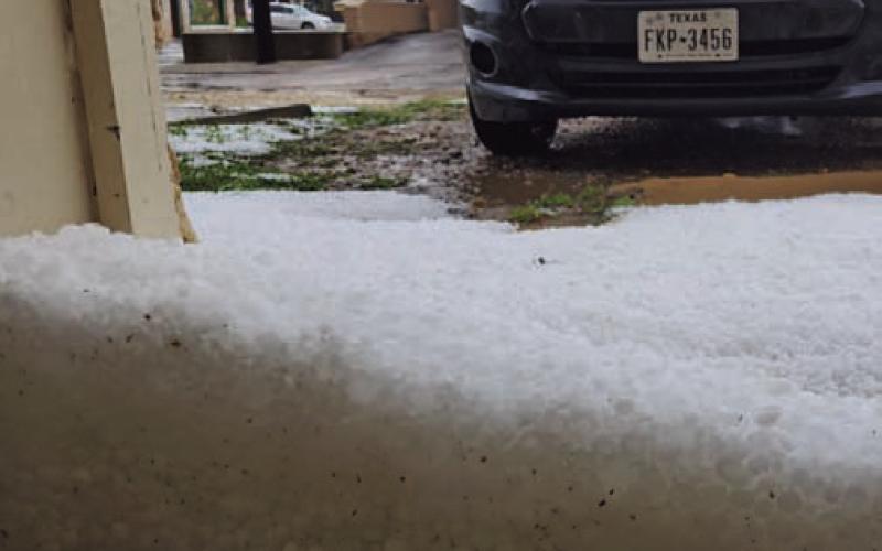 The Dispatch Record saw hail buildup against windows and doorways during a severe thunderstorm Friday morning. TERESA THORNTON | DISPATCH RECORD