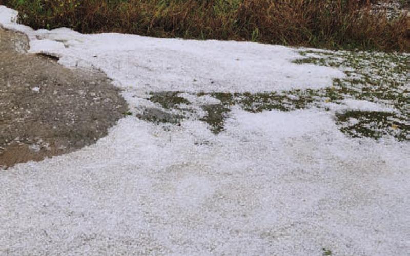 Tammy Davis sent this photo of hail that formed like a river at her home. COURTESY PHOTO