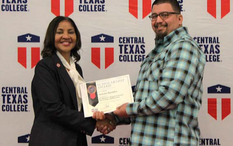 COURTESY PHOTO At Central Texas College Foundation’s 34th Annual Scholarship Ceremony, Nicholas Basaldua of Lampasas received the Dr. Edward L. Wagner Endowed Scholarship in Mathematics, presented by CTC Chancellor Dr. Michele J. Carter.
