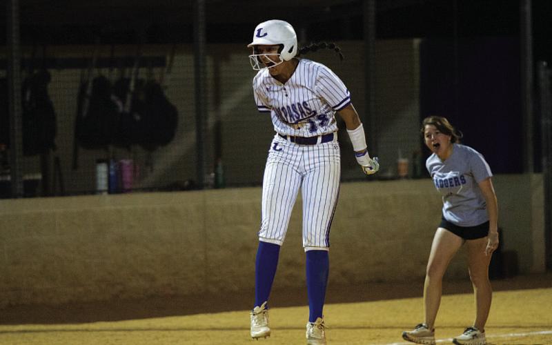 FILE PHOTO No sport expresses more enthusiasm than softball under the lights.