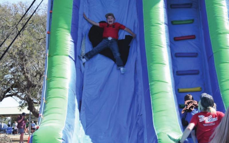 This inflatable slide was a big hit with the younger attendees at the Diamondback Jubilee in Lometa. Good weather helped boost the turnout at the weekend festival. ALEXANDRIA RANDOLPH | DISPATCH RECORD
