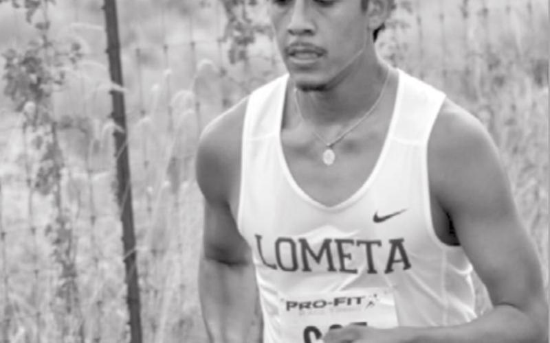 Enrique Prado competes in a meet earlier this season. JEFF LOWE | DISPATCH RECORD