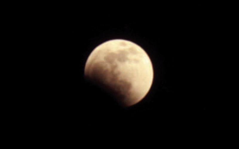 The partial eclipse of the moon should be visible across North America late Thursday night, with its peak to take place around 11:30 p.m. FILE PHOTO