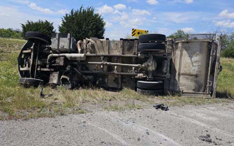This garbage truck overturned after a reported brake failure at the intersection of FM 580 East and FM 1715. COURTESY PHOTO