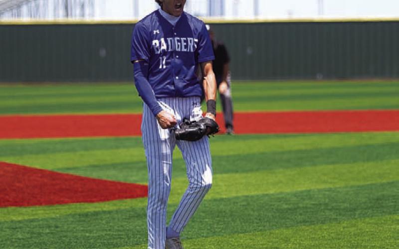 Kade Landry celebrates during the Badgers’ playoff series. FILE PHOTO