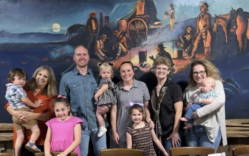 Paula Cantrell Landers, standing second from the right, was joined by her extended family in front of the mural painted by her father, the late Cliff Cantrell. COURTESY PHOTO