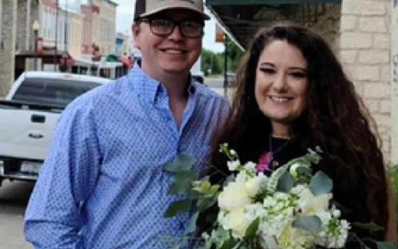 Crosby Green, right, co-owns Petal Peddlers with her husband, Zane. TERESA THORNTON | DISPATCH RECORD