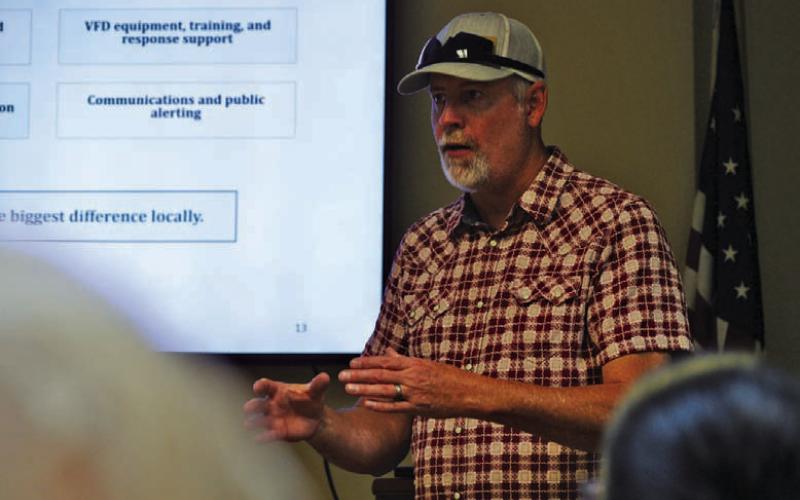 Casey Childers of Natural Resources Solutions discusses the steps the consulting firm will take to develop a wildfire plan for the county that will enable it to apply for grants. ERICK MITCHELL | DISPATCH RECORD