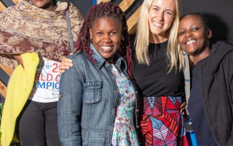 Morgann Schroeder, second from right, poses with her new Kenyan friends Sharon, Miriam and Eunice, left to right. COURTESY PHOTO