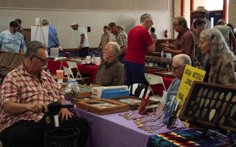 FILE PHOTO Vendors often take time to visit with attendees at Vision Lampasas’ Indian Artifact &amp;amp; Mineral and Gem Show. This year’s event is set for Sept. 12 from 9 a.m. to 3 p.m. in the old middle school cafeteria.