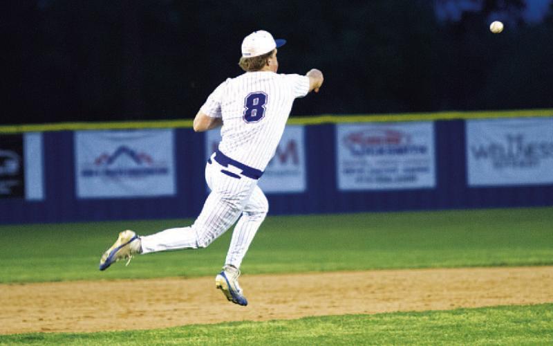 Cayhil Isom jumps to make a throw to second base for an out against Salado. HUNTER KING | DISPATCH RECORD