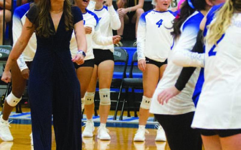 ERICK MITCHELL | DISPATCH RECORD Head coach Ali Tippie celebrates a Lady Badger victory earlier in the season.
