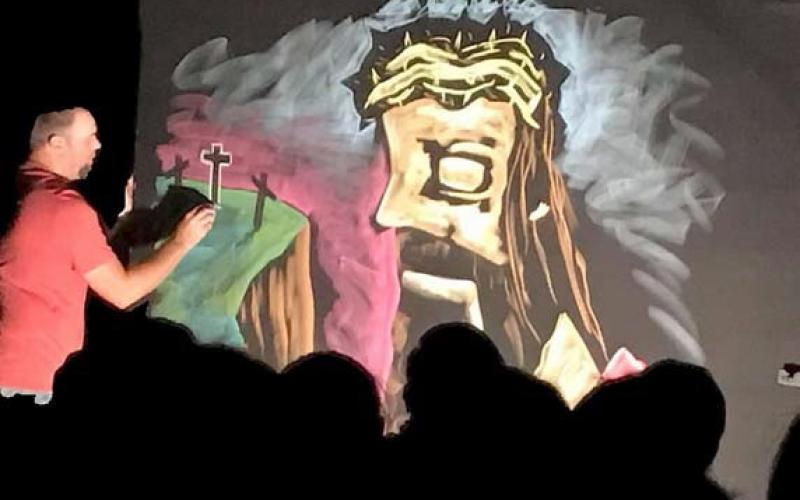 Cory Devivo has been with Masterpiece Ministries for 19 years. He uses his chalk art to tell the gospel story. Courtesy photo