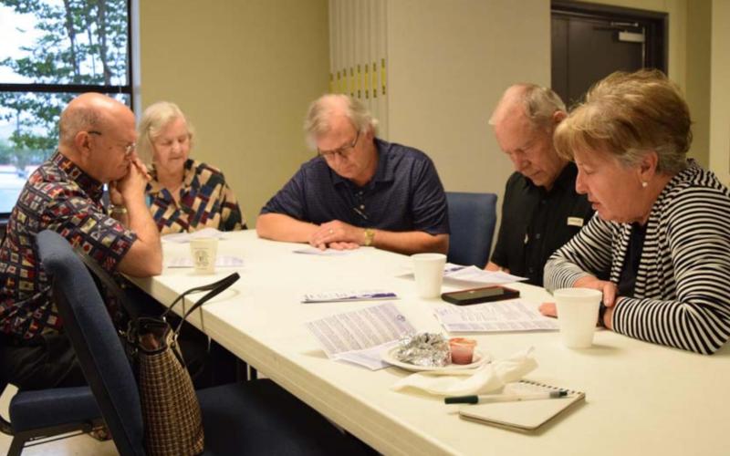 Lampasas-area believers joined in group prayer Thursday morning at New Covenant Church to observe the National Day of Prayer. Pictured here, left to right, are Rick Willis, Joyce Bronaugh, Kevin Jones, Randy Taylor and Joyce Taylor. ALEXANDRIA RANDOLPH | DISPATCH RECORD