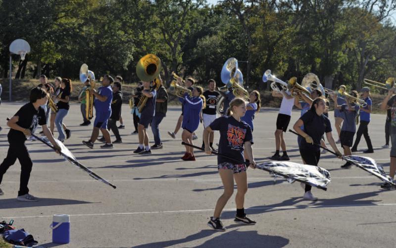 The Lampasas High School Badger Band goes through its preparations on Wednesday afternoon before heading to Saturday’s UIL 4A Area D Marching Band Contest in Pflugerville. ERICK MITCHELL | DISPATCH RECORD