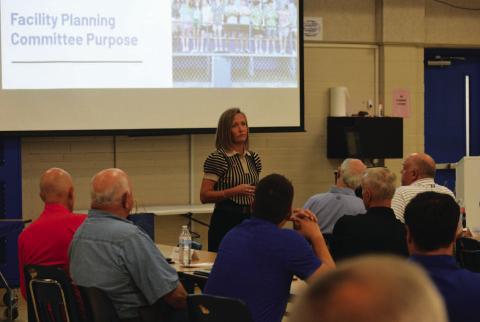 Kelly Trompler of the firm WRA Architects offers a PowerPoint presentation Monday at the Lampasas Middle School cafeteria for the Facilities Planning Committee. Committee members will make a recommendation later this year on how the Lampasas ISD could pursue bond funding for upgraded facilities. ERICK MITCHELL | DISPATCH RECORD