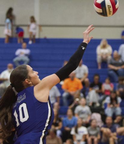Ysabella Swain makes a play at the net in the Lady Badgers’ three-set victory over the Waco Lady Lions on Tuesday. ERICK MITCHELL | DISPATCH RECORD