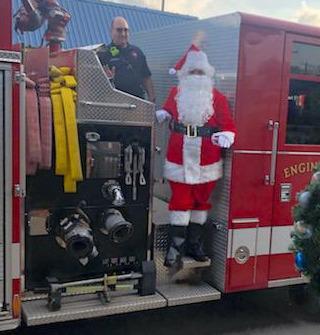 Santa Claus made a special appearance at Storm’s Drive-In on Dec. 7. Murray Events Inc. and the Alycia Hooper Real Estate Team arranged for jolly ol’ Saint Nick to be dropped off by a Lampasas Fire Department engine. The event promoted the fire department’s toy drive through collections of unwrapped toys. courtesy photo