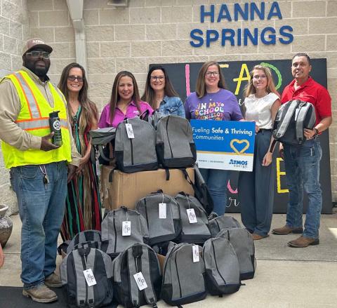 Atmos Energy makes backpack donations to local schools