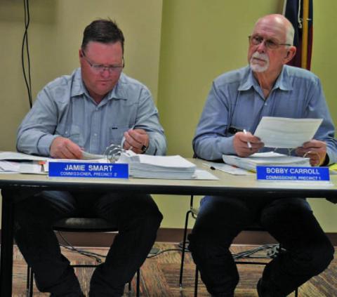County Commissioners Jamie Smart, left, and Bobby Carroll were on different sides of a vote to rescind the outdoor burn ban. ERICK MITCHELL | DISPATCH RECORD