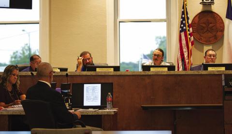 City Manager Finley deGraffenreid looks on as members of the Lampasas City Council discuss business at their meeting Monday evening. HUNTER KING | DISPATCH RECORD