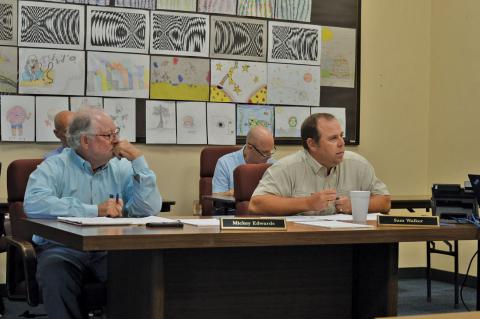 From left, Lampasas ISD Board of Trustees Place 1 Mickey Edwards and Place 6 Sam Walker look on during Tuesday's meeting. ERICK MITCHELL | DISPATCH RECORD