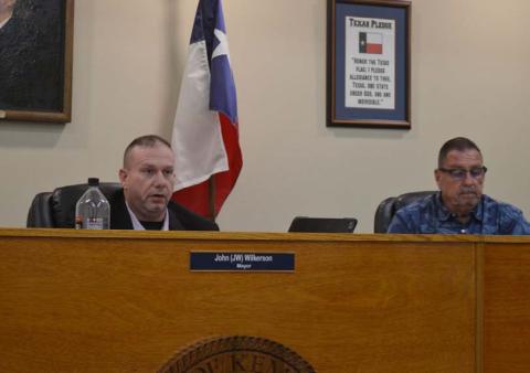 Mayor John Wilkerson, at left, and Councilman Rob Green listen to administrative reports during Tuesday night’s Kempner City Council meeting. ERICK MITCHELL | DISPATCH RECORD