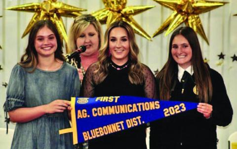 Lampasas FFA members, from left, Morgan Littlefield, Avery Hopson and Paige Rutland placed first in district, first in area and first in state in Agricultural Communications. Not pictured: team member Jamie Resa. FFA adviser Judy Hail, in back, said, “Our teams who traveled to state contests to compete represented Lampasas well and now rank in the top 2% in the state in their area of competition.” JOYCESARAH MCCABE | DISPATCH RECORD