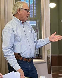 Paul Wilborn, representing WCID #1, speaks to the Commissioners Court about flood-control concerns he has related to a proposed Pitt Creek Ranch development. HUNTER KING | DISPATCH RECORD