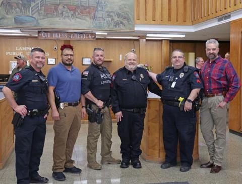 Sgt. Tony Barrio, center, was celebrated at a retirement reception for his years of service to the city. With the officer are, from left, Patrol Lt. Chuck Montgomery, Sgt. Investigator Fidel Morua, Coryell County Constable Guy Bevridge, Lampasas Police Sgt. Steve Sheldon and Police Chief Jody Cummings joycesarah mccabe | dispatch record
