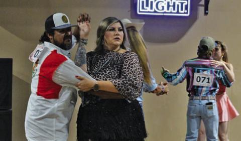 Armondo Rosales helps his dance partner, Karli Rosales, make their way around the dance floor. ERICK MITCHELL | DISPATCH RECORD
