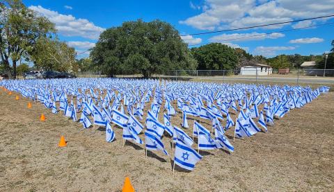People from eight different ministries helped participate in putting up 1,200 flags over the weekend to memorialize the lives lost Oct. 7, 2023 in an attack on Gaza. “The event was a terrific success,” said Brian Parker, senior pastor of One Church Cove. The flags were on display this week at the Kempner Family Community Development Center. courtesy photo