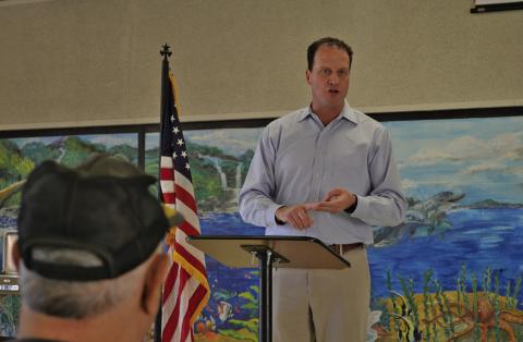 U.S. Rep. August Pfluger (R-San Angelo) speaks to those in attendance at his first town hall meeting in Lampasas. The gathering was held Thursday at the former middle school cafeteria. ERICK MITCHELL | DISPATCH RECORD
