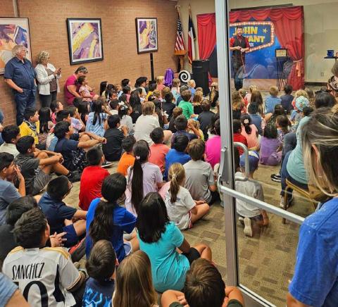 COURTESY | SHANDA SUBIA The Lampasas Public Library saw a crowd of more than 120 visitors for John O’Bryant’s magic show on Friday morning.