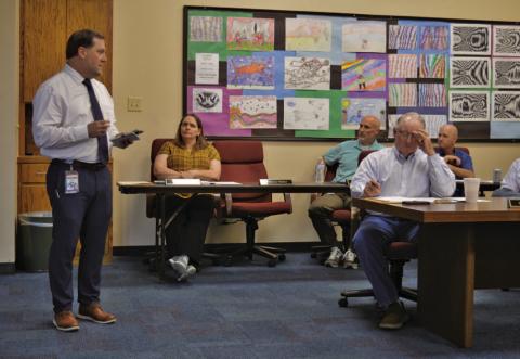 At left, Lampasas Middle School Principal Wes Graham provides a presentation to school board members during Monday’s meeting. ERICK MITCHELL | DISPATCH RECORD