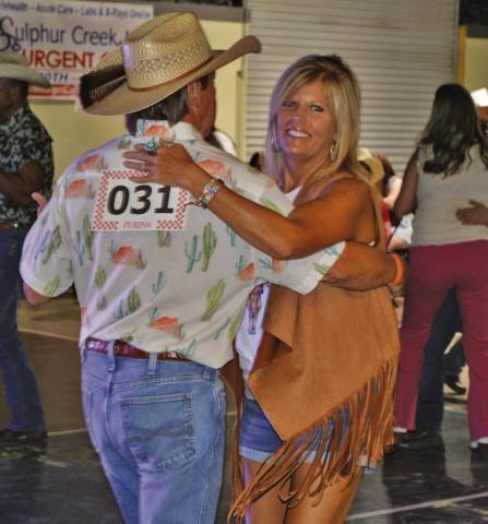 Ronda Martin dances with her partner, Mark Wengler. The pair were crowned overall Spring Ho Dance Contest champions. ERICK MITCHELL | DISPATCH RECORD