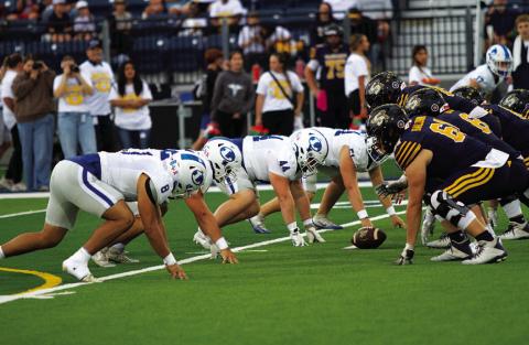 The Lampasas defensive line prepares to rush before the ball is snapped. HUNTER KING | DISPATCH RECORD