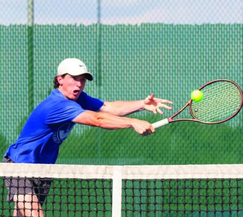 Badger’s first line boys’ player, Elijah Copeland, returns a volley from Marble Falls’ first line double duo. Copeland and his partner, Jack Allison, have been standouts for the Badgers in recent matches. ANA SOFIA MEYER | DISPATCH RECORD