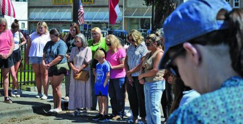 Lampasas residents gathered around the county courthouse Thursday in a moment of prayer for the nation 24 years after the Sept. 11 attacks and the day after the murder of Charlie Kirk, a conservative activist and Turning Point USA co-founder. ERICK MITCHELL | DISPATCH RECORD