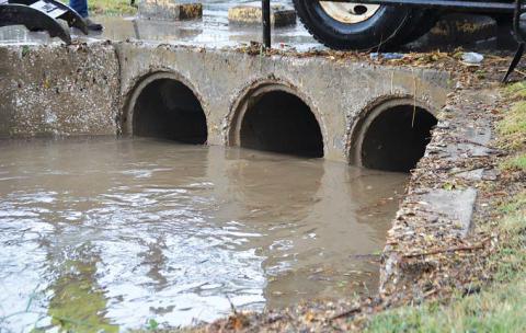 Creeks, low-water crossings swell with runoff