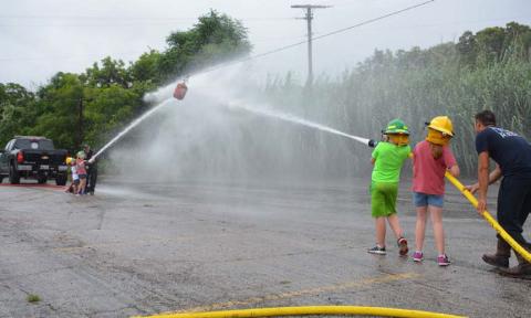 The Lampasas Volunteer Fire Department offers its version of “water polo” during Kids’ Day Activities. FILE PHOTO