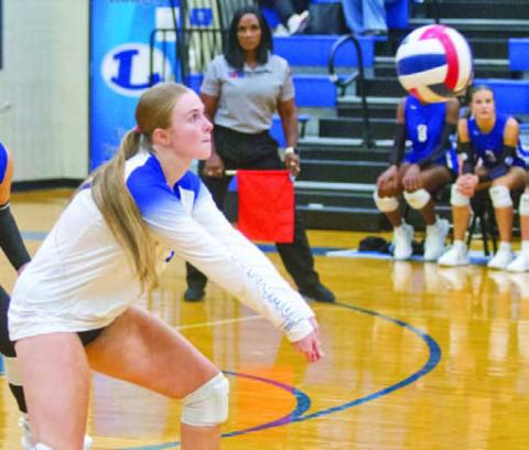 Junior libero Kari Kepler receives service in one of the Lady Badgers’ early-season matches. Kepler has become a six rotation player for coach Ali Tippie this season, taking on the leadership of her position. ANA SOFIA MEYERL | DISPATCH RECORD