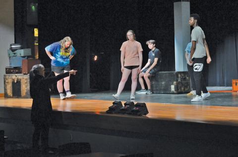 erick mitchell| dispatch record Lampasas High School theater director Greta Peterson leads students through a rehearsal Monday afternoon for their One-Act play titled “The Visit,” by Friedrich Durrenmatt. LHS will compete in the district UIL One-Act Play competition on March 5 at Burnet High School.