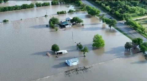 An aeriel view of Adamsville residences shows significant flooding after the Lampasas River overflowed its banks following the Cinco De Mayo flood earlier this year. FILE PHOTO