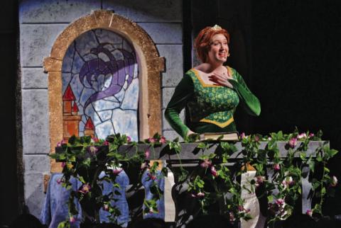 LHS student Samantha Sturgeon, portraying the character Fiona, performs a solo during last Friday’s performance of “Shrek the Musical Jr.” ERICK MITCHELL | DISPATCH RECORD
