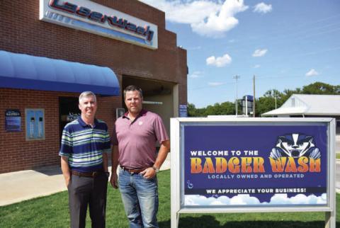 William McAnelly, left, and Jim Collins purchased Badger Car Wash last February. The business consists of a four-bay, self-serve car wash and a state-of-the-art automatic bay. COURTESY PHOTO